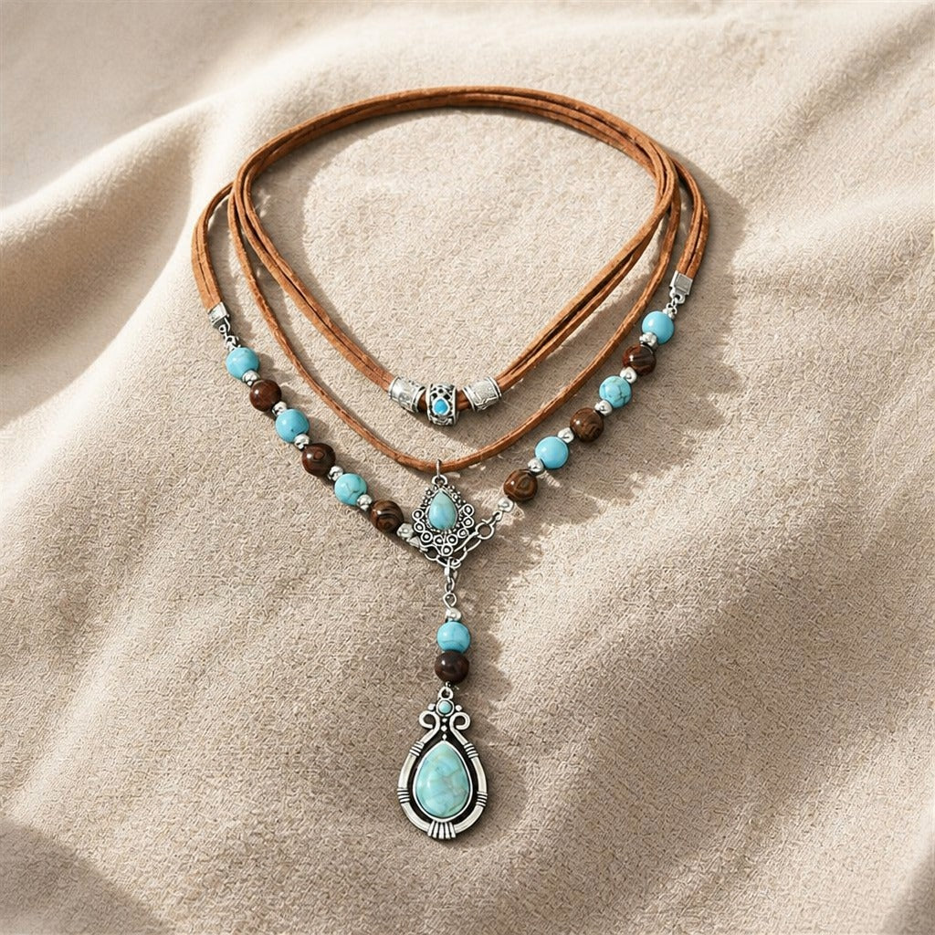 Turquoise Teardrop Pendant Necklace with Layered Beads and Leather Cord — view 2