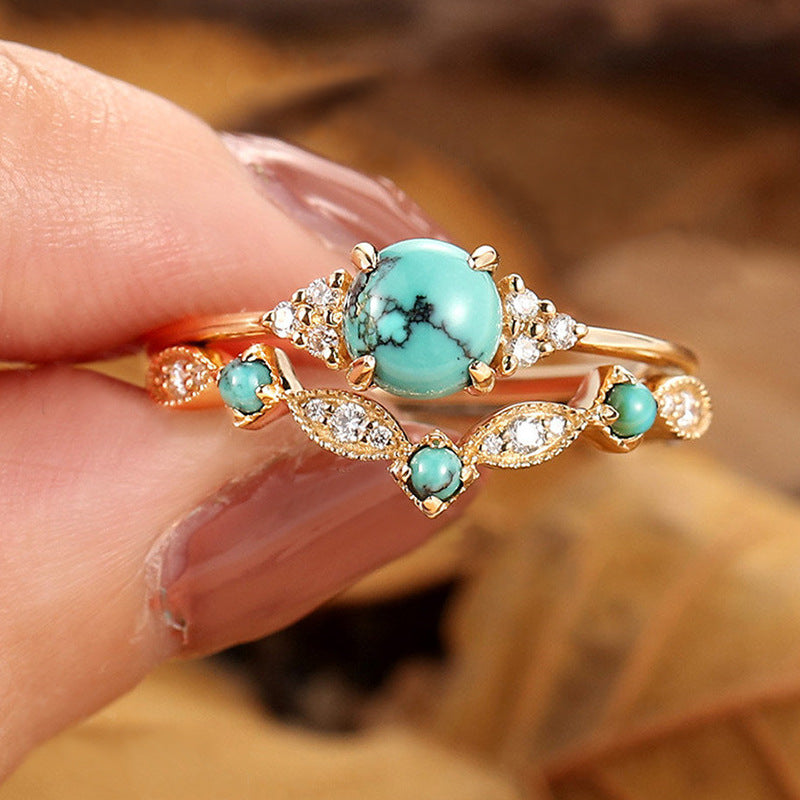 Turquoise Cabochon Ring Set with Scroll Detail in Gold Tone