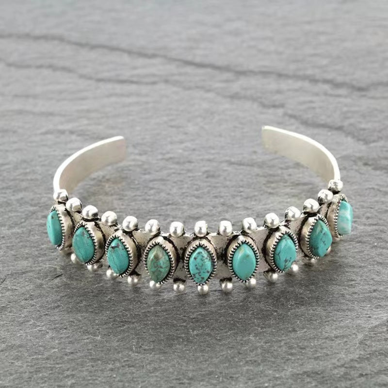 Oval Turquoise Cuff Bracelet with Granulated Silver Bezel Setting