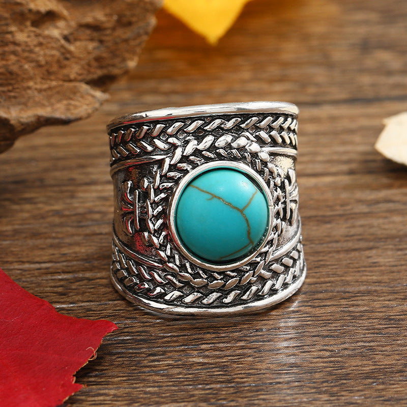 Round Turquoise Cabochon Ring with Open Braided Silver-Tone Band