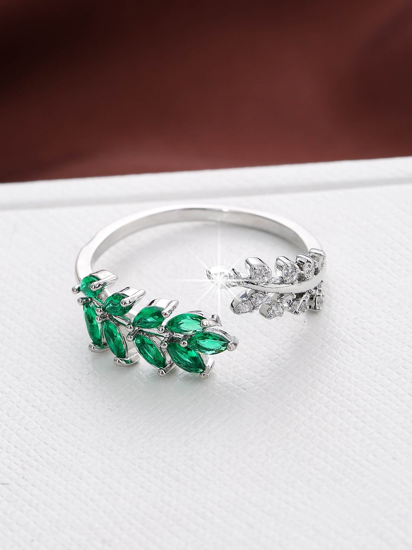 Leaf Motif Emerald and Sapphire Cluster Ring with Open Band