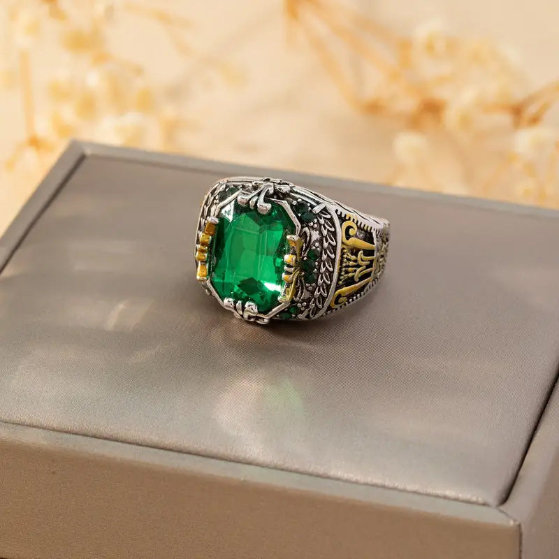Rectangular Emerald Ring with Ornate Carved Band in Mixed Metal Tones
