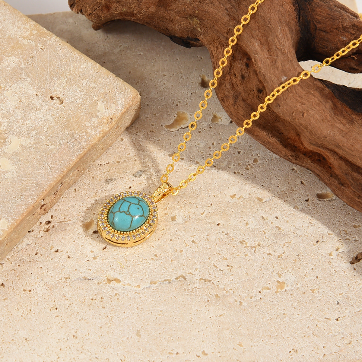 Oval Turquoise Pendant Necklace with Crystal Halo and Gold-Tone Chain