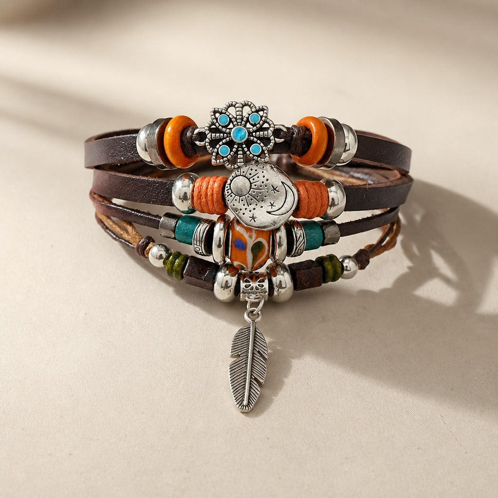 Layered Leather Boho Bracelet with Feather, Moon and Leaf Charms — main image
