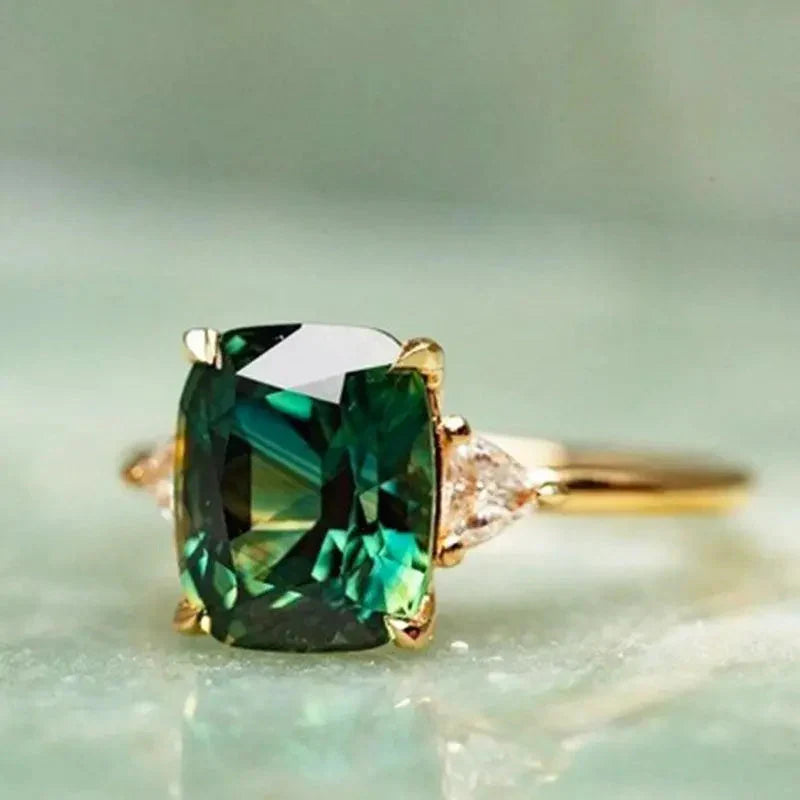 Cushion-Cut Emerald Three-Stone Ring with Triangular Accent Stones — main image