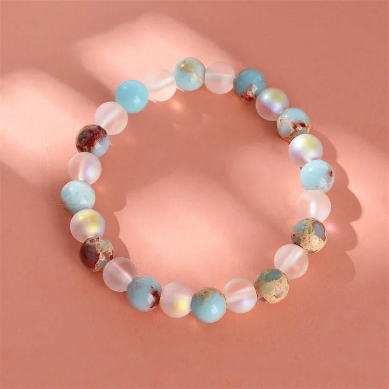 Pastel Beaded Stretch Bracelet with Mixed Glass and Stone Beads in Pink, Blue and Amber Tones — main image