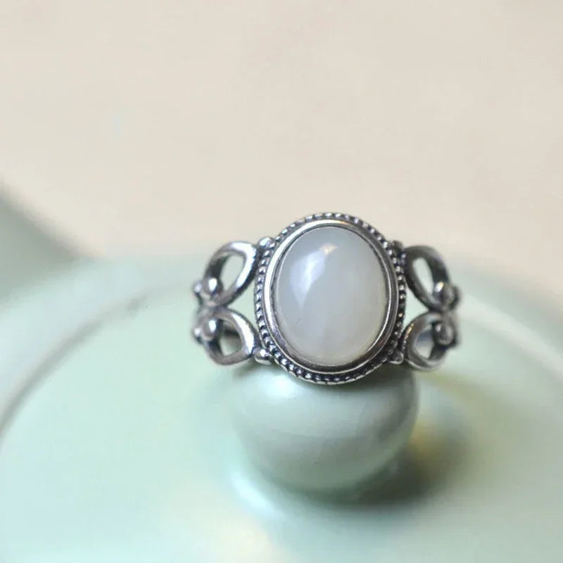 Oval Jade-Toned Stone Ring with Scrolled Silver-Tone Band, Adjustable — main image