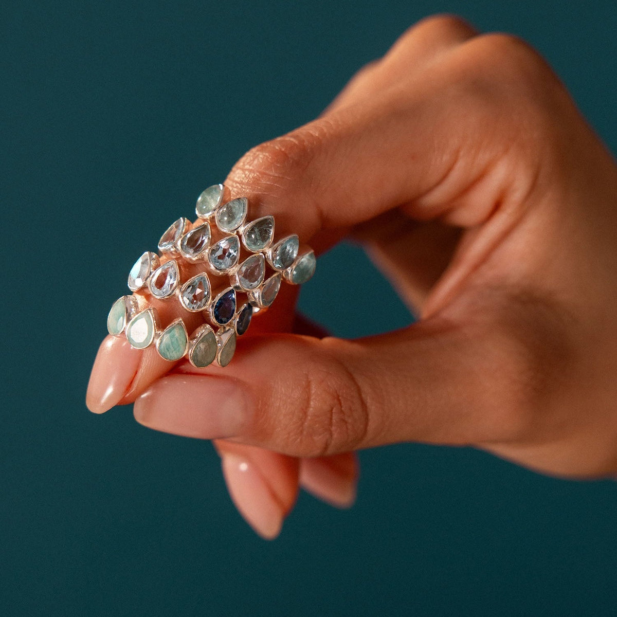 Aquamarine Teardrop Ring with Five Stones in Silver Tone