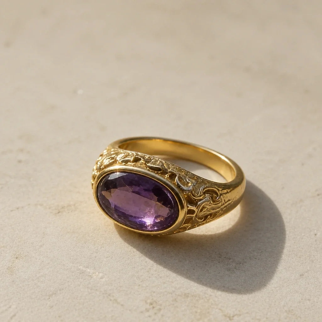 Oval Amethyst Signet Ring with Gold Scrollwork Detail