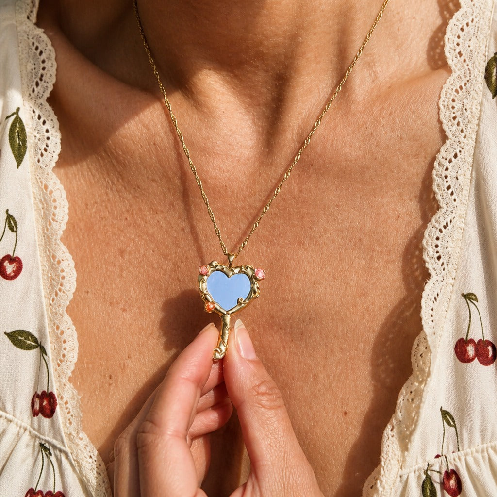 Heart-Shaped Light Blue Stone Pendant Necklace with Gold-Tone Scrollwork — main image