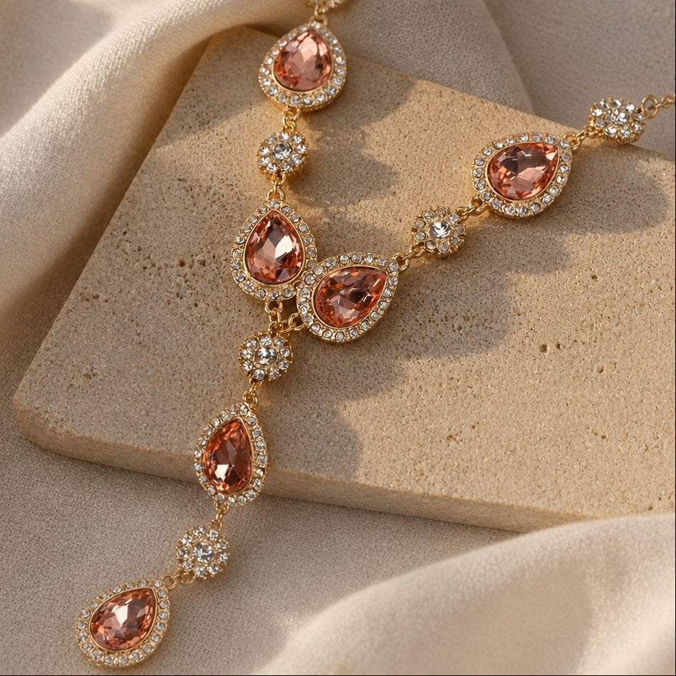 Teardrop Cubic Zirconia Necklace with Round Accent Stones in Gold-Tone Setting — main image