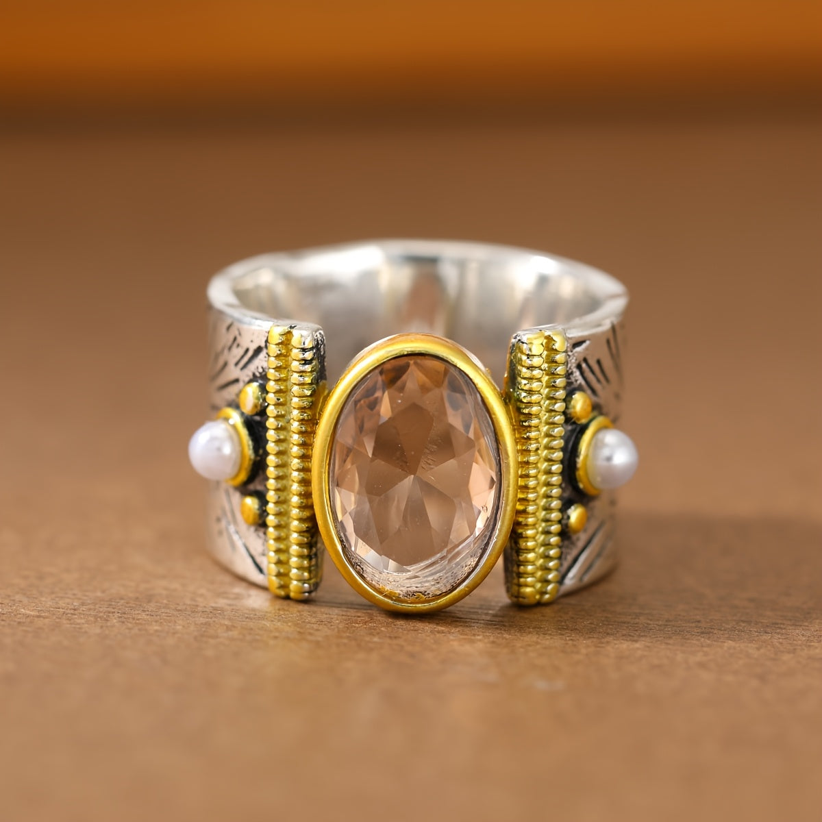 Oval Cubic Zirconia Ring with Pearl Accents and Wide Textured Band