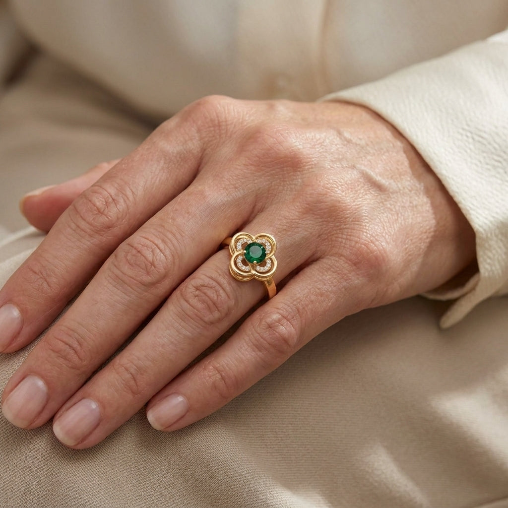 clover halo emerald spinning ring gold — lifestyle