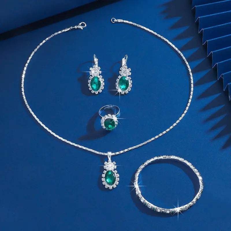 Oval Emerald Halo Jewelry Set with Necklace, Earrings, Bracelet & Ring