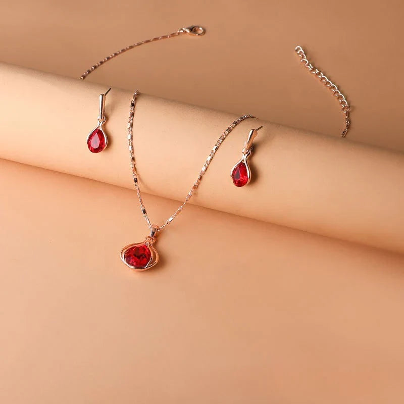 Teardrop Red Crystal Necklace & Earring Set in Rose Gold Tone with Bezel Setting — view 3