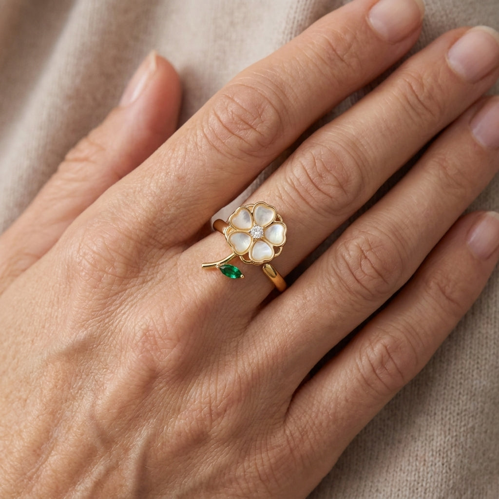 emerald leaf flower spinning ring gold — lifestyle