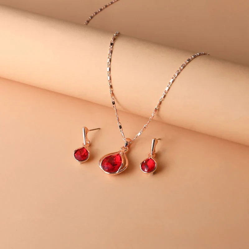 Teardrop Red Crystal Necklace & Earring Set in Rose Gold Tone with Bezel Setting — view 2