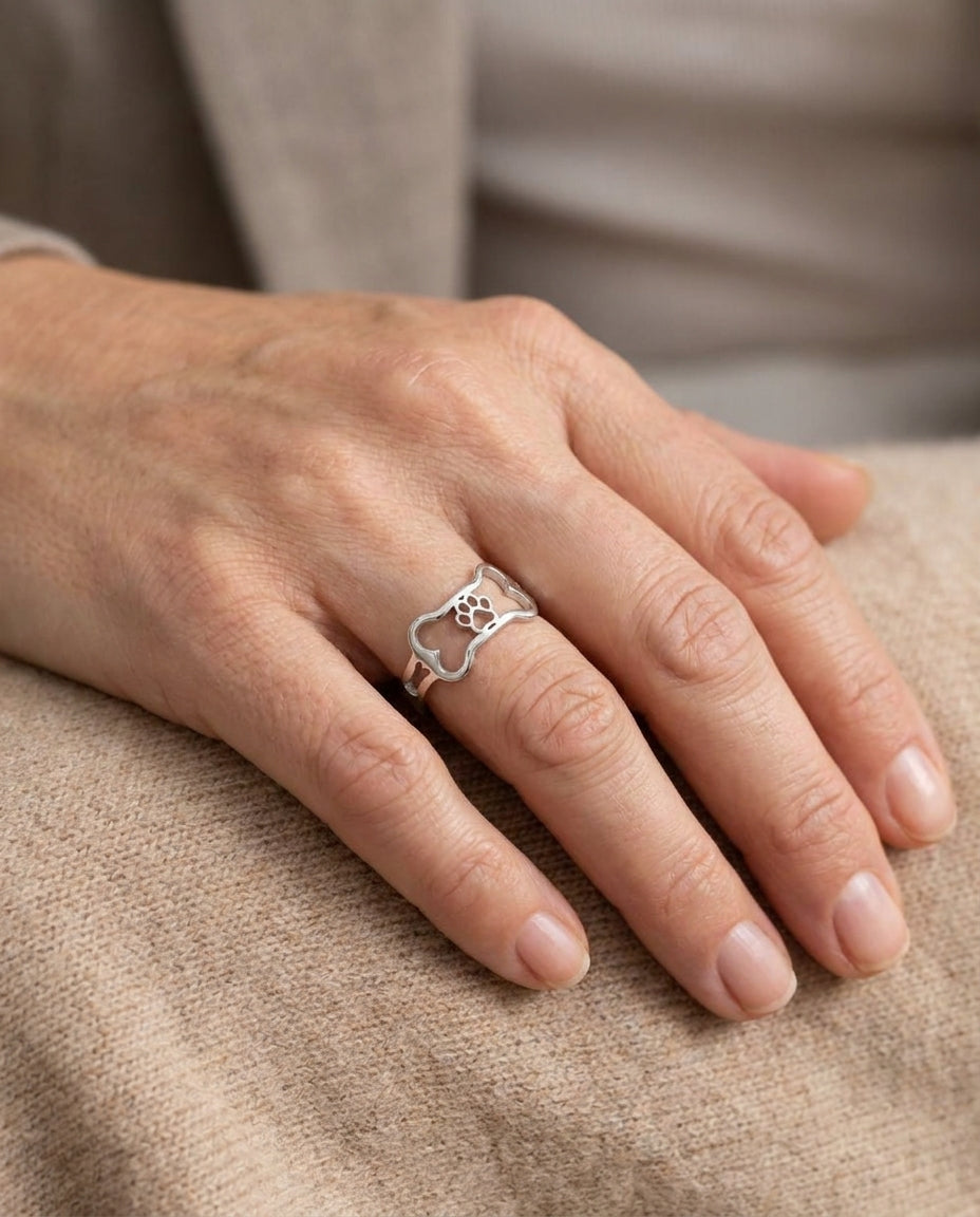 Estelle & Ruby Dog Paw & Bone Motif Ring, Stainless Steel, Adjustable, Sizes 6-10 (AI-generated lifestyle image)