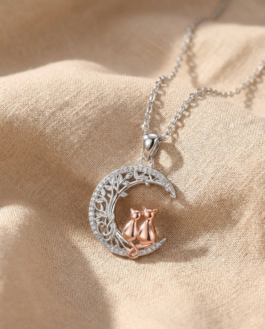 Estelle & Ruby Cat & Moon Pendant Necklace – Crescent Moon Filigree, Two Cats, CZ Stones, Silver & Rose Gold Tone (AI-generated studio image)