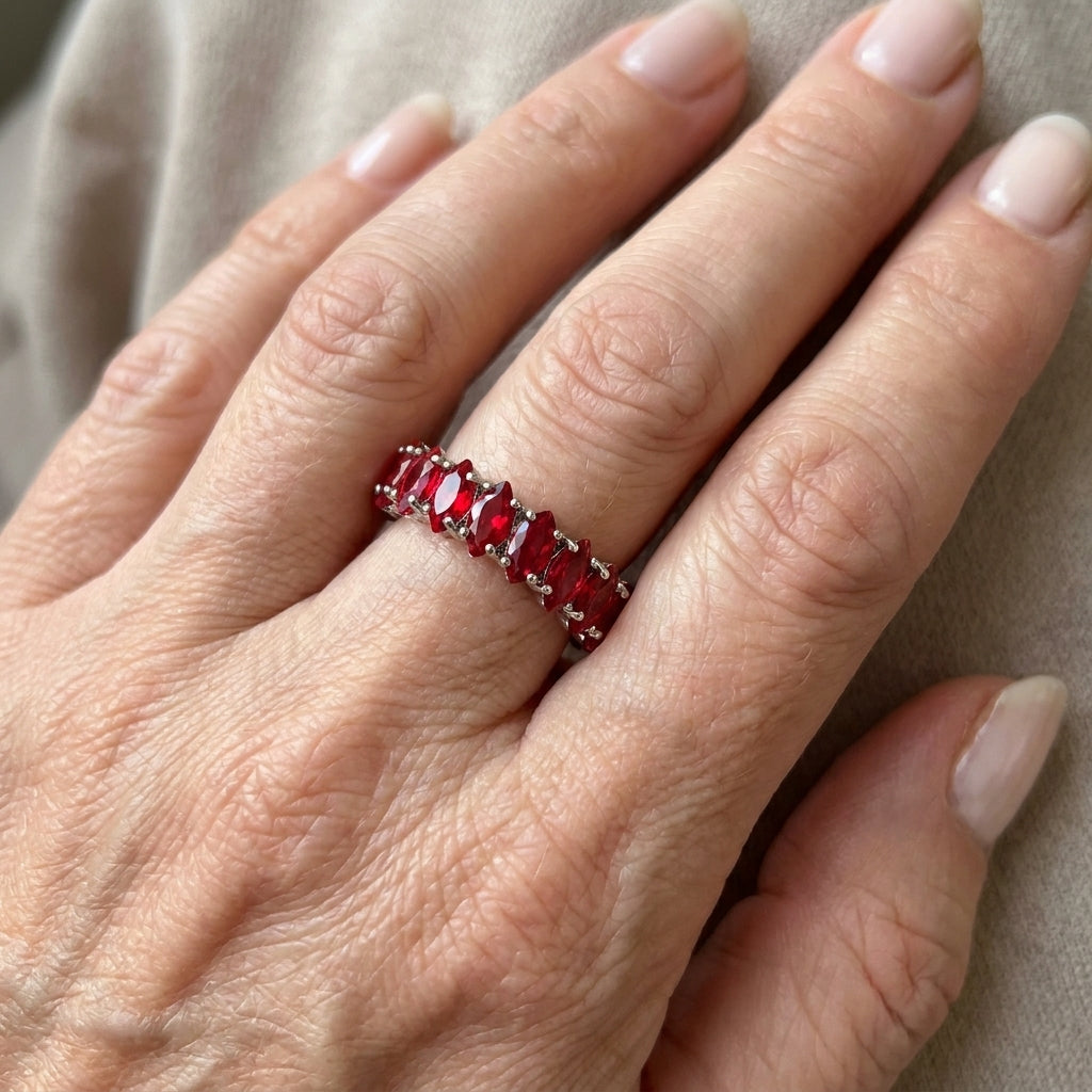 gold ring with red crystal inlays — lifestyle