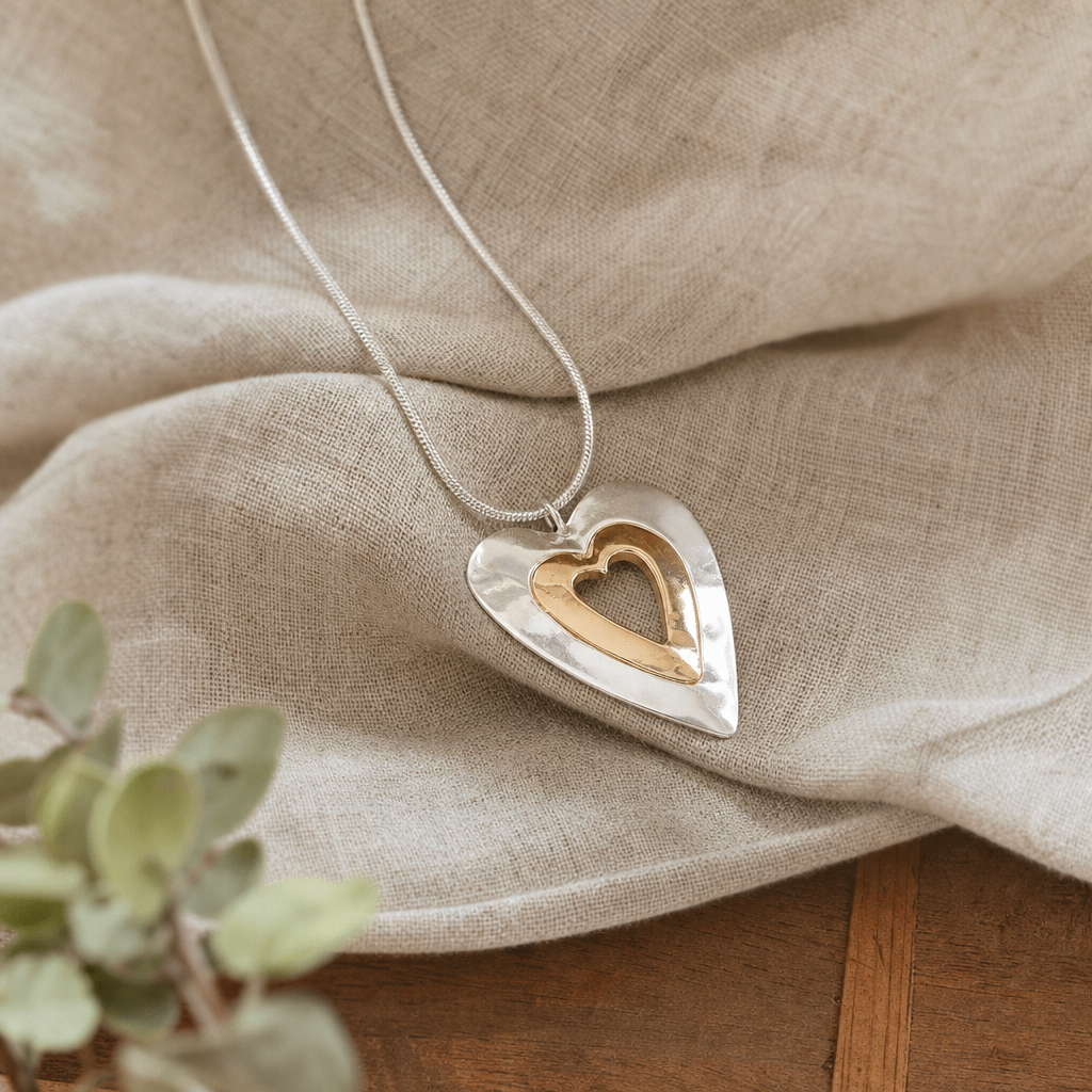 Nested Heart Pendant Necklace in Silver and Gold Tone on Snake Chain