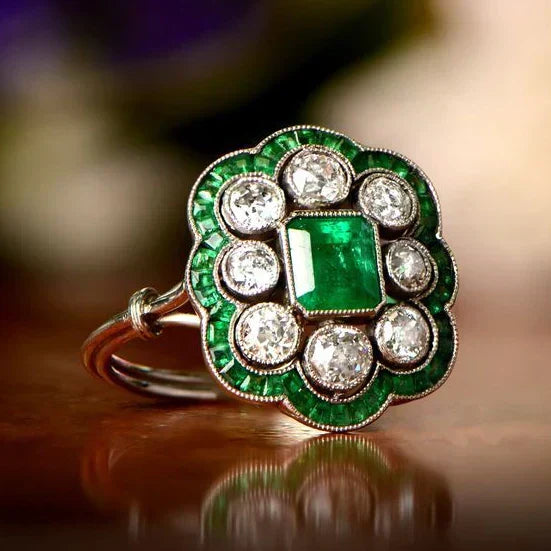 Art Deco Emerald Cocktail Ring with Diamond Halo and Two-Tone Band — main image