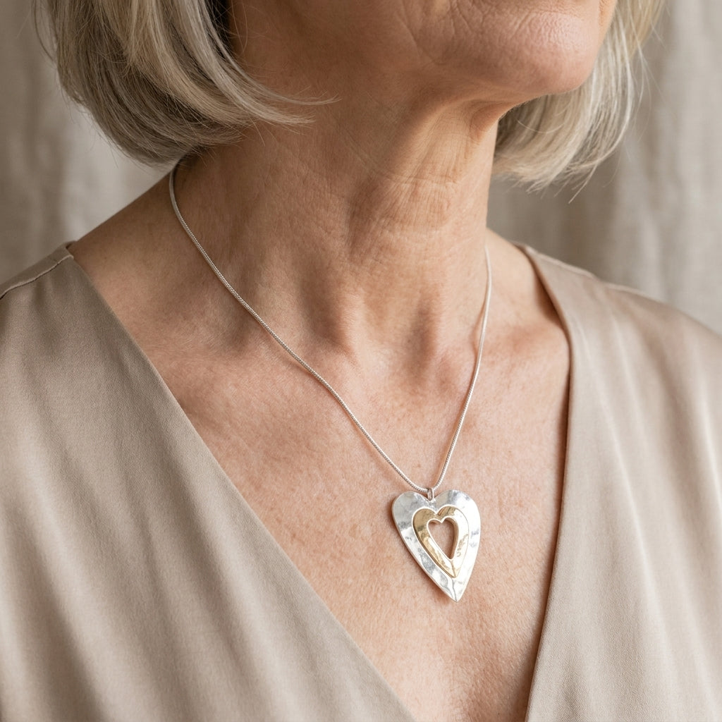 lustrous silver gold heart pendant necklace — lifestyle