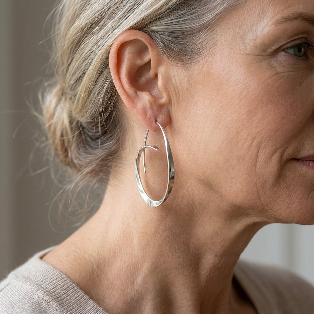 open spiral drop earrings — lifestyle