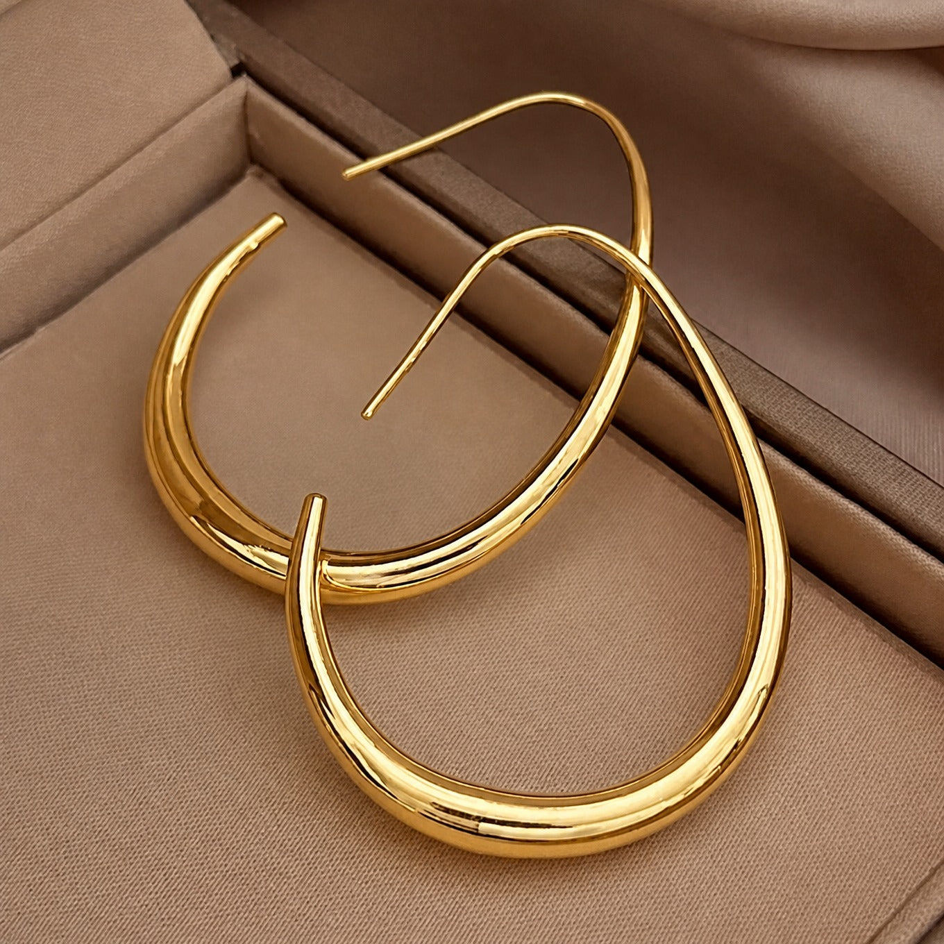 Teardrop Gold Hoop Earrings with Polished Finish